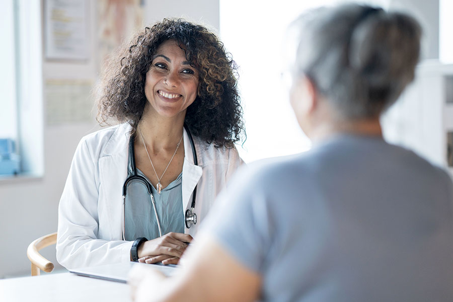 Doctor Talking with a Patient - stock photo