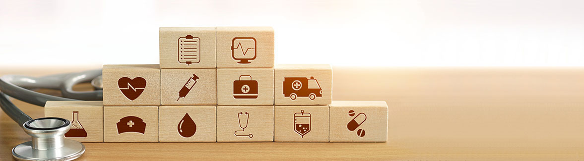 Health care concept, Hand of medicine doctor holding wood block and stacking up icon healthcare medical and stethoscope on background.