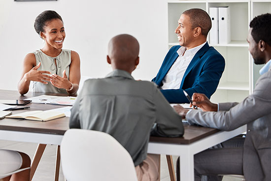 Meeting, planning and strategy of business woman, team leader or manager talking of KPI goal, mission or finance growth development. Brainstorming ideas and listening group for about us or our vision - stock photo