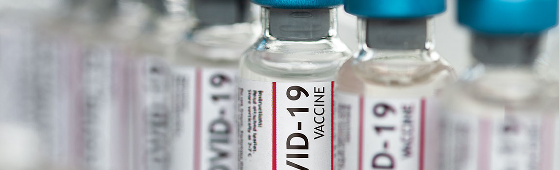 Covid-19 Coronavirus Vaccine vials in a row macro close up - stock photo
